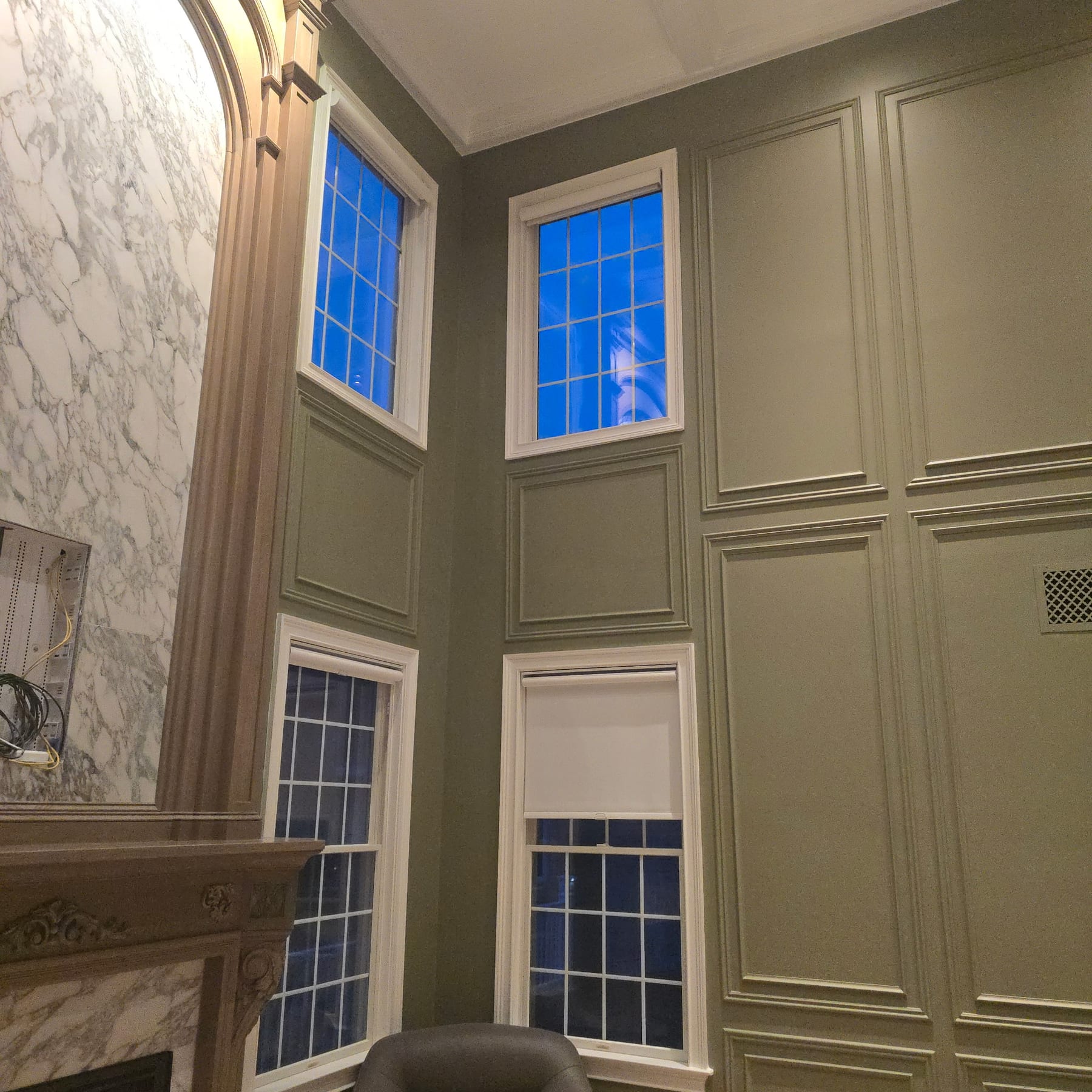 Sage green wainscoting installed
