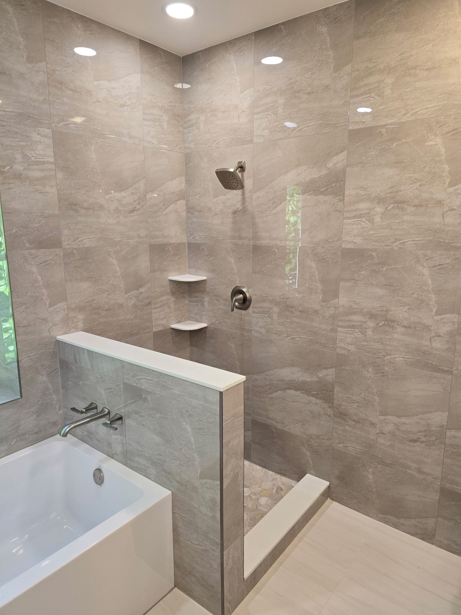 Spa-style bathroom with walk-in shower and soaking tub